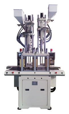 Βιομηχανική περιστροφική επιτραπέζια μηχανή χύτευσης έγχυσης 150 γραμμαρίων 1000 τόνοι πλαστικό δύο χρωμάτων